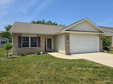 Merrillville house for rent - A house with a garage and a driveway.