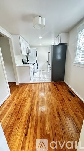 Durham house for rent - A kitchen with a refrigerator and a staircase.
