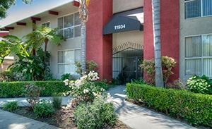 Valley Village apartment for rent - A red and white building with a black awning that says 11934.