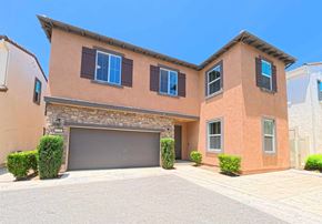 Chino house for rent - A two-story house with a garage and a driveway.