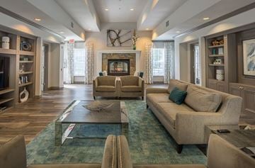 Middle Island apartment for rent - a large living room with couches and a fireplace