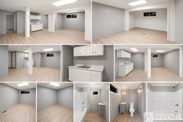 Niagara Falls apartment for rent - A kitchen with white cabinets and a marble countertop.