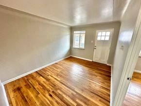 Lakewood apartment for rent - A room with carpeted floor and two windows.