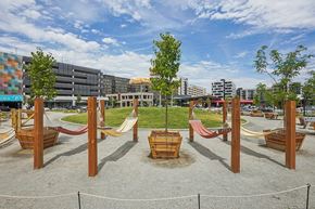 Denver apartment for rent - A playground with a swing set and a slide.