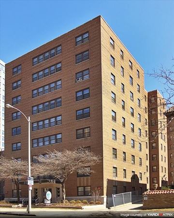 Milwaukee apartment for rent - a tall brick building on the side of a street