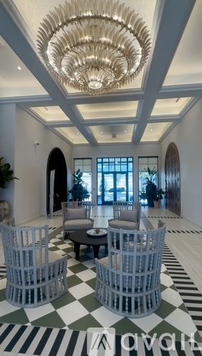 Tampa apartment for rent - A large indoor space with a planter in the middle.