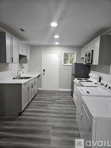Fort Valley apartment for rent - A kitchen with a white counter top and a white sink.