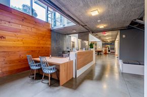 Portland apartment for rent - a dining room with a wooden table and chairs