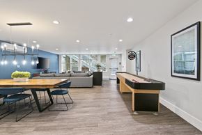 Seattle apartment for rent - A room with a pool table and a couch.