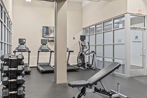 Richmond apartment for rent - a gym with treadmills and other exercise equipment at theevinccicci apartments