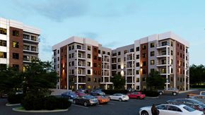 Edmonton apartment for rent - A parking lot with cars and apartment buildings.