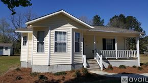 Dublin house for rent - A house with a porch and a small front yard.