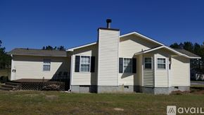 Dublin house for rent - A house with a white exterior and a brown roof is available for purchase.