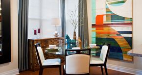 Pittsburgh apartment for rent - a dining room with a table and chairs and a painting