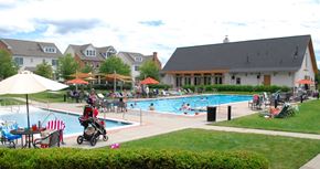 Pittsburgh apartment for rent - a group of people swimming in a pool at a resort