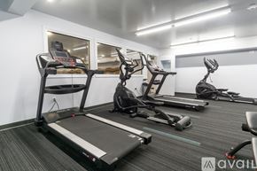 Johnson City apartment for rent - A gym with treadmills and elliptical machines.