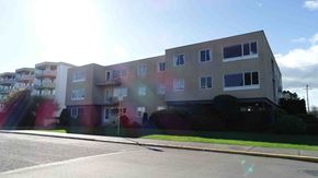 Victoria apartment for rent - Apartment building on a sunny day.