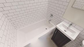 Victoria apartment for rent - A white tiled bathroom with a white bathtub and sink.