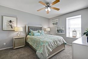 Leavenworth apartment for rent - A bedroom with a bed, nightstands, and pictures on the wall.