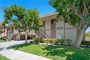 Burbank apartment for rent - A tree in front of a house with the number 2314 on it.