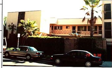 Burbank apartment for rent - A black car is parked on the side of the road.