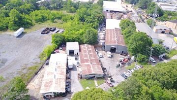 Atlanta apartment for rent - An aerial view of a parking lot with several cars and buildings.