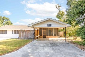 Houma apartment for rent - A house with the number 113 on the front.