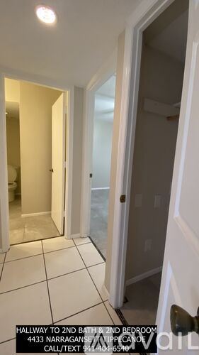 Sarasota condo for rent - A hallway leading to the second bathroom and second bedroom.