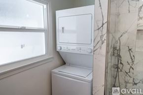Los Angeles house for rent - A white dishwasher is installed in a kitchen.