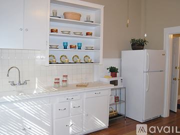San Angelo apartment for rent - A kitchen with white cabinets and appliances.