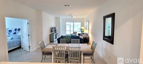 Englewood house for rent - A dining room with a table and chairs is shown.