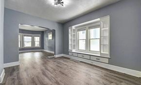 Cleveland apartment for rent - A room with a window and a ceiling fan.