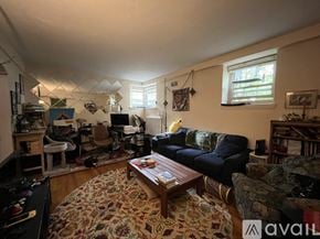 Brookline apartment for rent - A living room with a couch, chair, and coffee table.