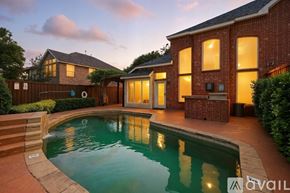 Lewisville house for rent - A house with a pool in the backyard.