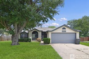 Killeen house for rent - A house with a black car parked in front.