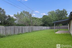 Killeen house for rent - A house with a fence and green grass in front.
