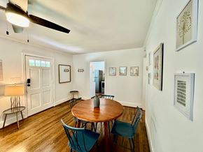 Columbia house for rent - A dining room with a table and chairs.