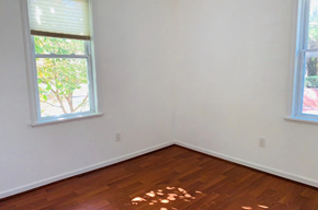 Washington apartment for rent - A room with a window and a wooden floor.