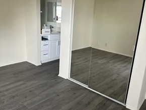 Los Angeles apartment for rent - A bathroom with a white vanity and a mirror.