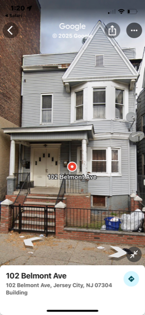 New Jersey apartment for rent - A grey house with a black gate in front of it.