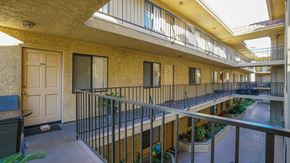 Glendale apartment for rent - A balcony with a table and chairs is seen in the image.