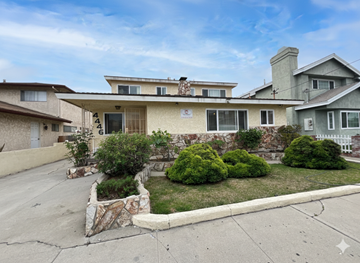 Hawthorne apartment for rent - A house with a well-maintained front yard.