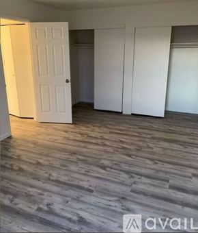 Lake Havasu City apartment for rent - A bathroom with a sink, mirror, and towel rack.