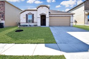Killeen house for rent - A house with a garage and driveway in front.