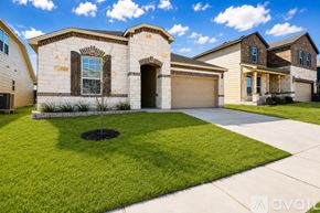 Killeen house for rent - A house with a brown front yard and a driveway.