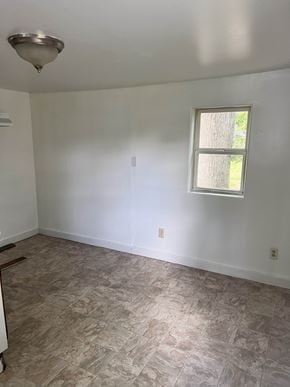 Bay City apartment for rent - A room with a window and a light fixture on the ceiling.