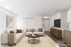 Philadelphia apartment for rent - A room with wooden floors and white walls.