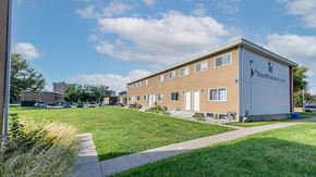 Edmonton apartment for rent - A kitchen with a staircase leading to the upper floor.