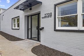 Altoona apartment for rent - A white building with the number 2708 Weinwood Rd on the front.