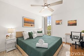 San Diego apartment for rent - A room with two pool tables and a bench.